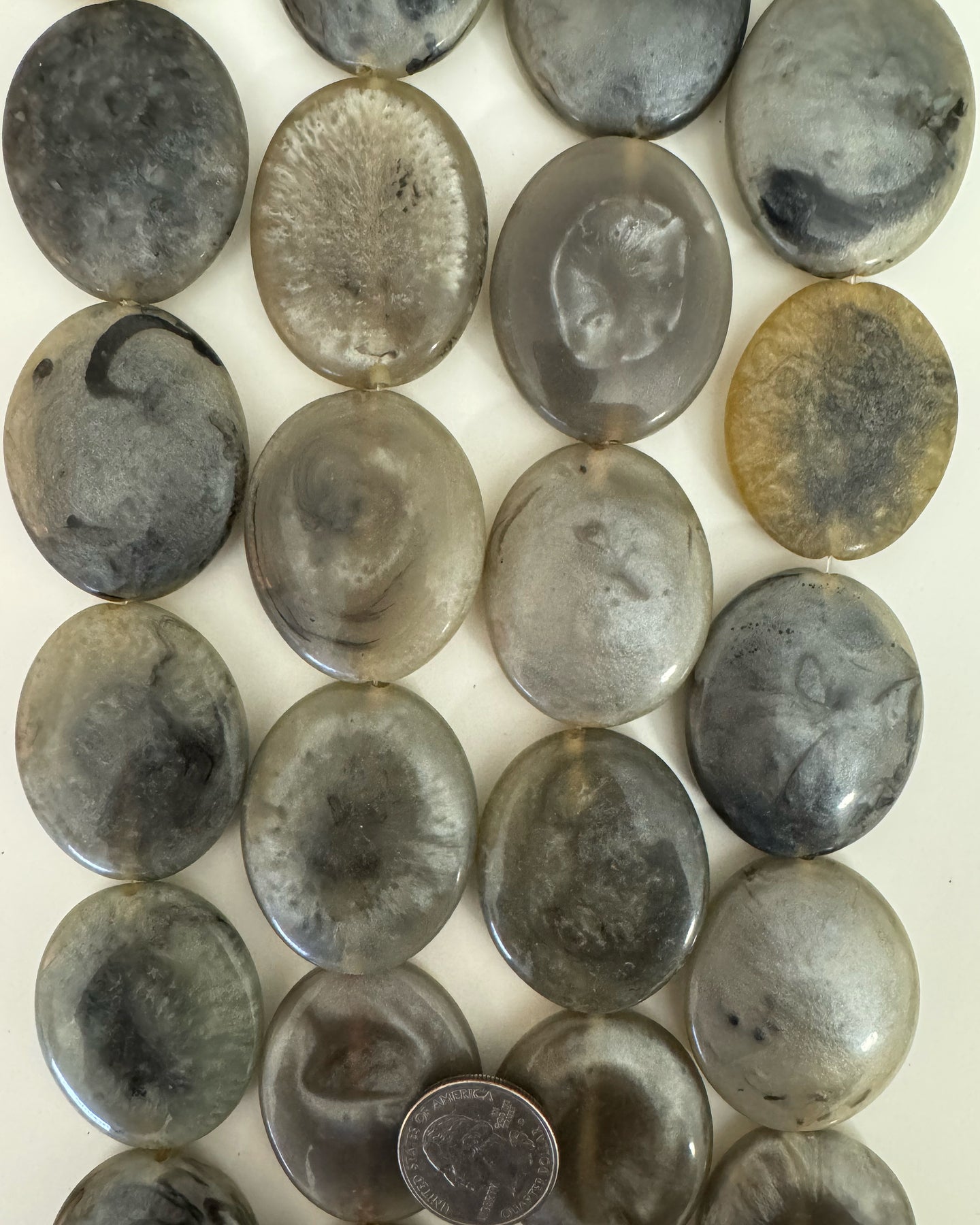 resin, dark pearly yellow gray, 43x33x8mm oval, 15