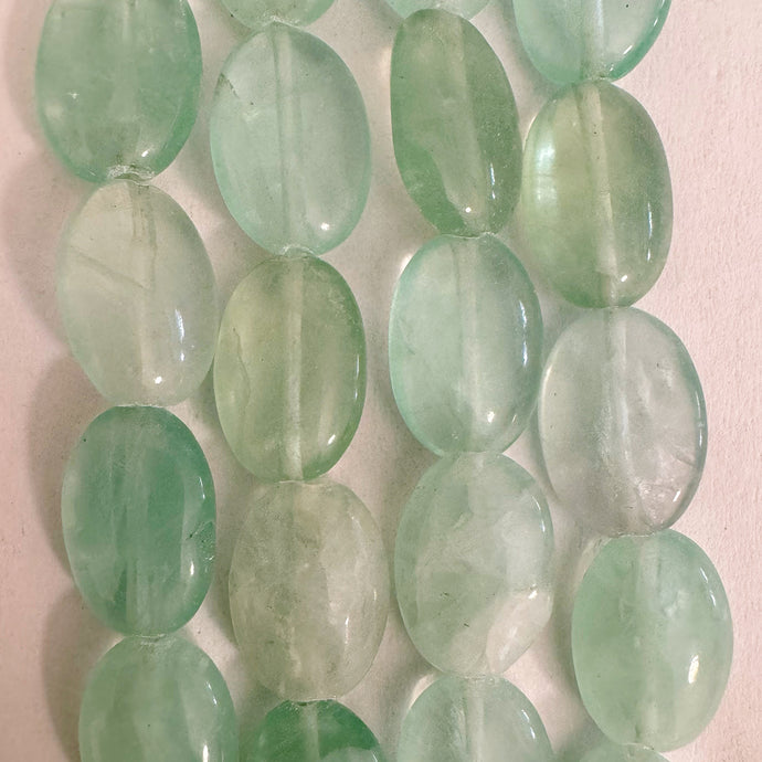 green fluorite, 13x9x5mm puff oval, 15