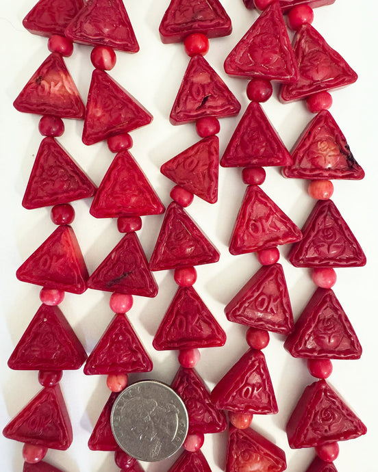 color enhanced ox blood coral, hand carved 2 sided floral OK motif, 22x22x7mm triangle, 15