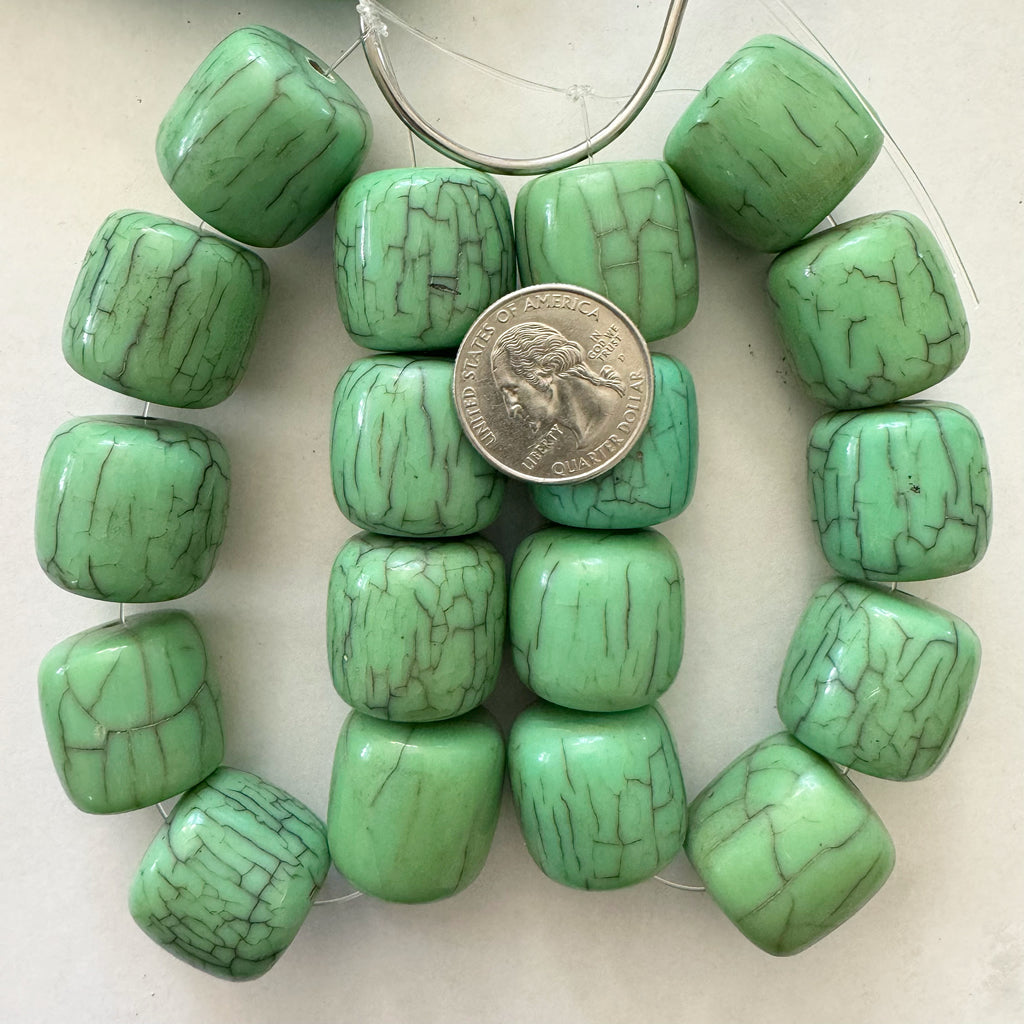 vintage look crackle motif resin, pale bright blue green, 25x22mm barrel, 9 piece strand, sold per strand