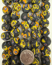 millefiori motif glass, matte black yellow orange white red, 19x17mm rondelle, 15" strand, sold per strand