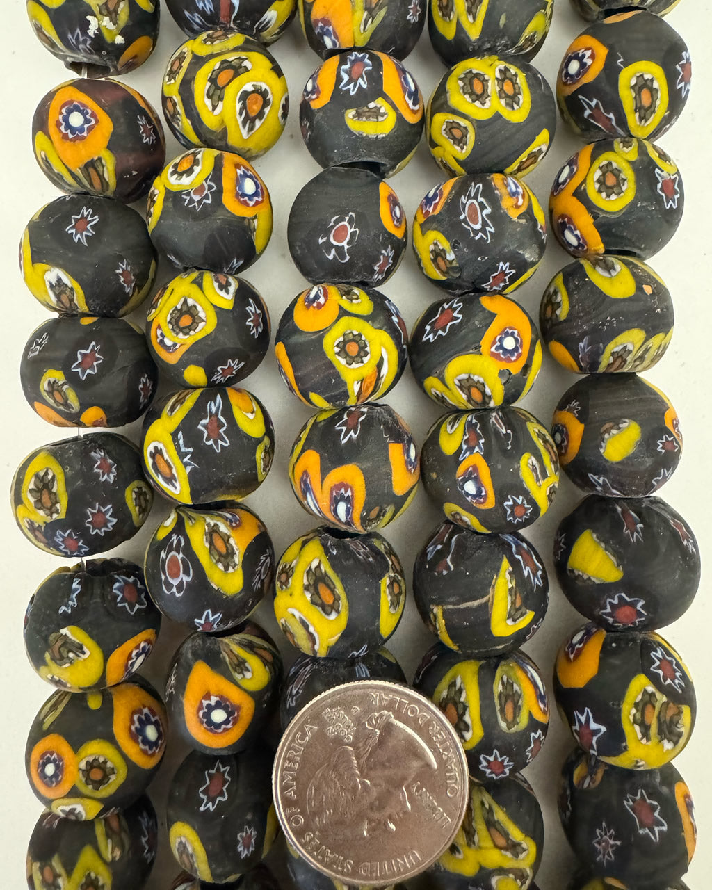 millefiori motif glass, matte black yellow orange white red, 19x17mm rondelle, 15