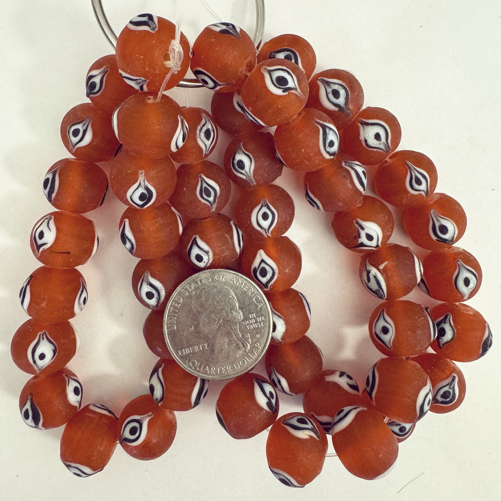 evil eye motif glass, matte finish pale orange red black white , 14mm round size mix, 16 piece strand, sold per strand