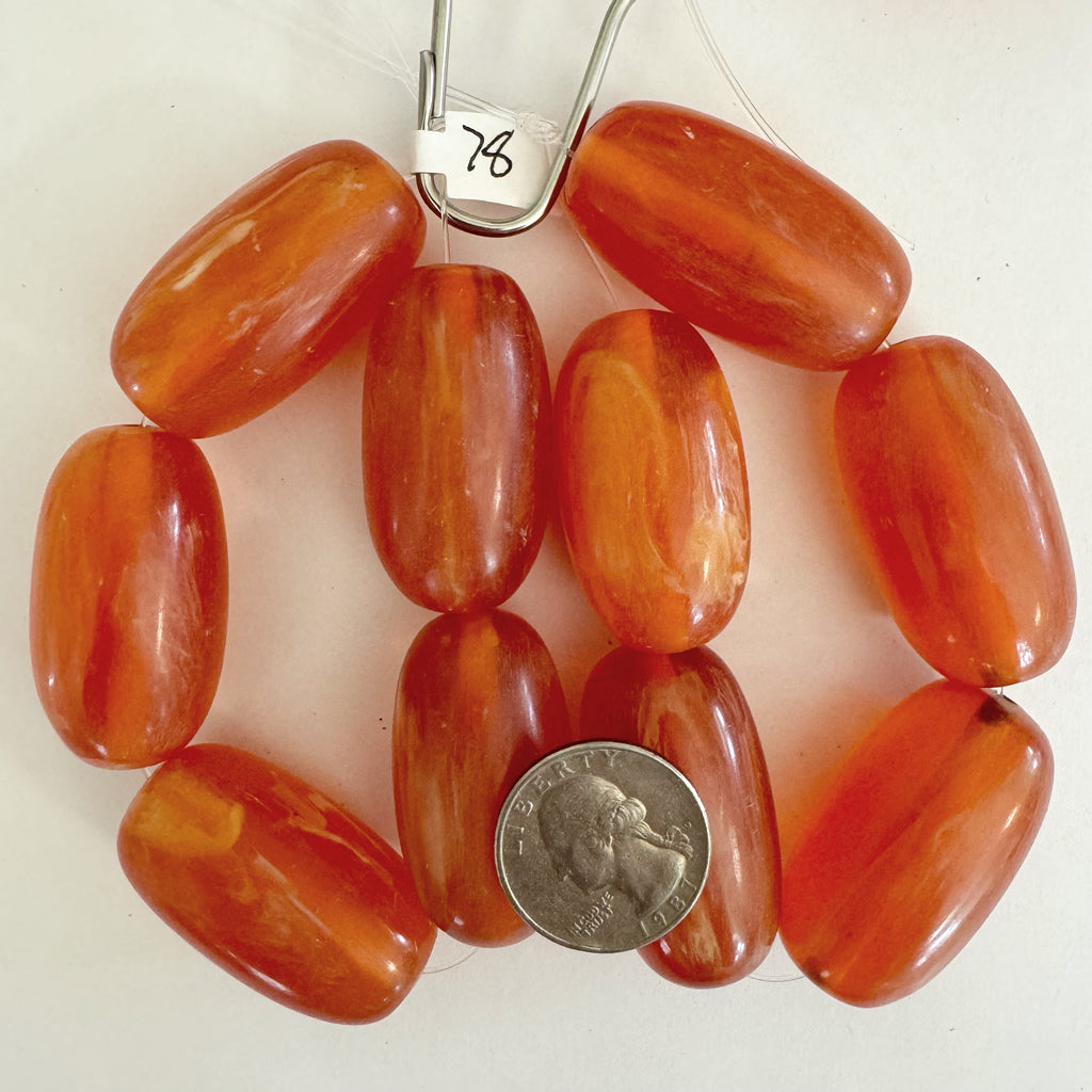 faux amber resin, amber red orange white swirl, 41x23mm tube, 5pc strand, sold per strand