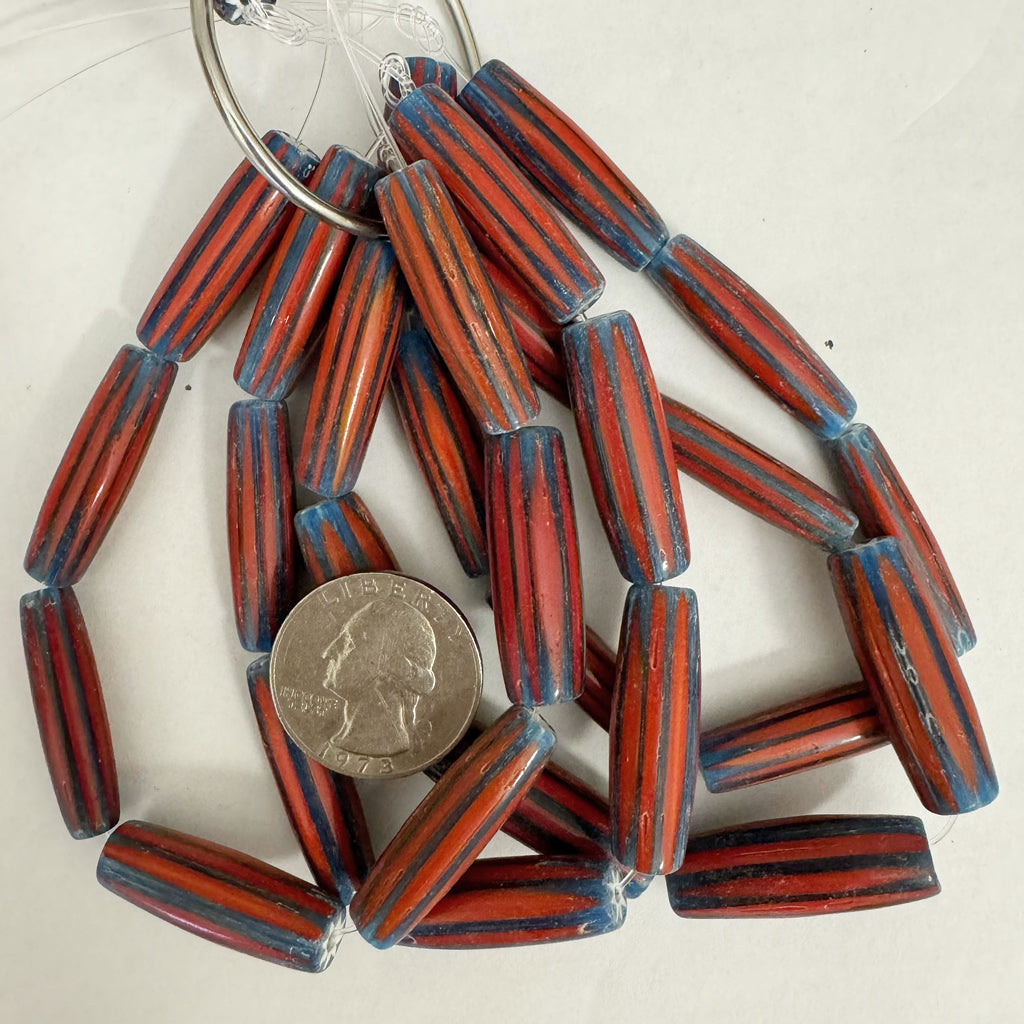 chevron motif glass, pale red blue white, 30x10mm mixed size bowed tube, 7 piece strand, sold per strand