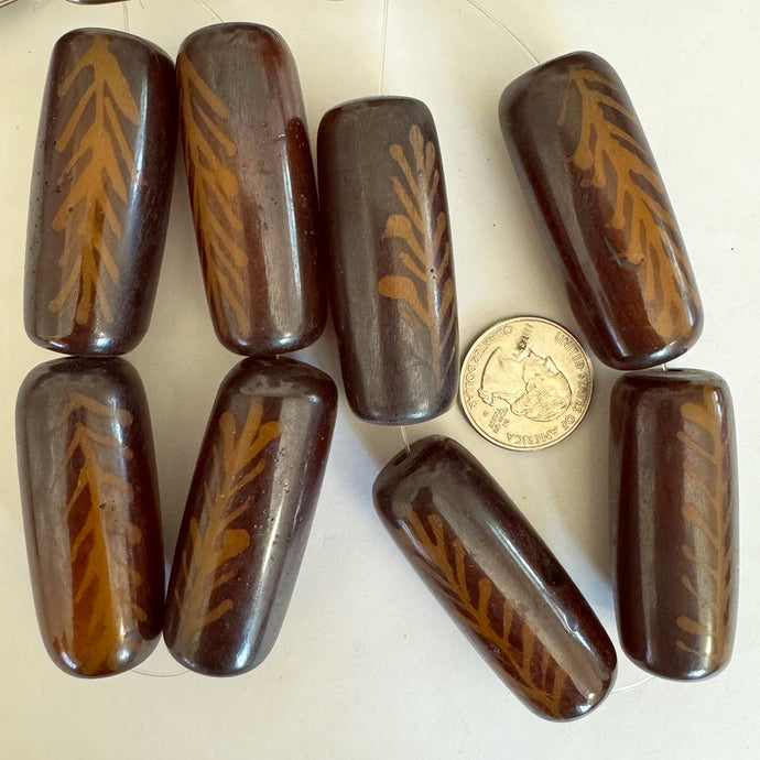 nature design motif resin, darker and lighter red golden brown 51x20mm tube, 4pc strand, sold per strand