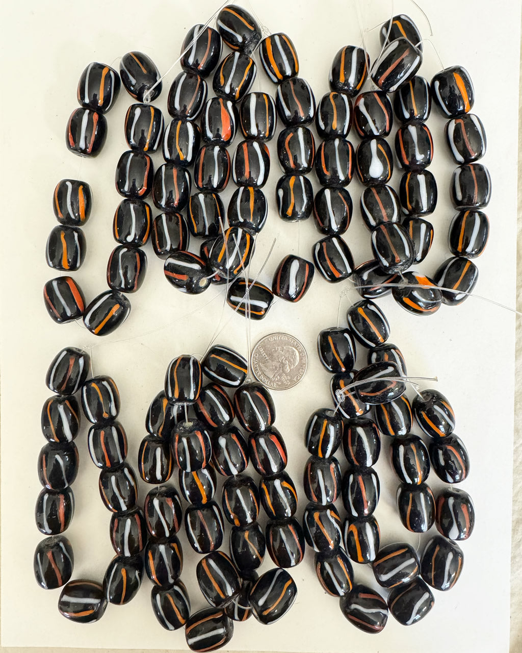 stripes motif glass, black white orange, 18x16mm barrel, 11 piece strand, 10 strand closeout lot