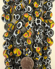 circles motif glass, matte black yellow white red, 19x17mm rondelle, 15" strand, sold per strand