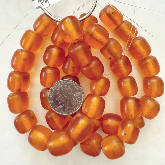 vintage look faux amber resin, translucent red orange 16x16mm barrel, 14pc strand, sold per strand