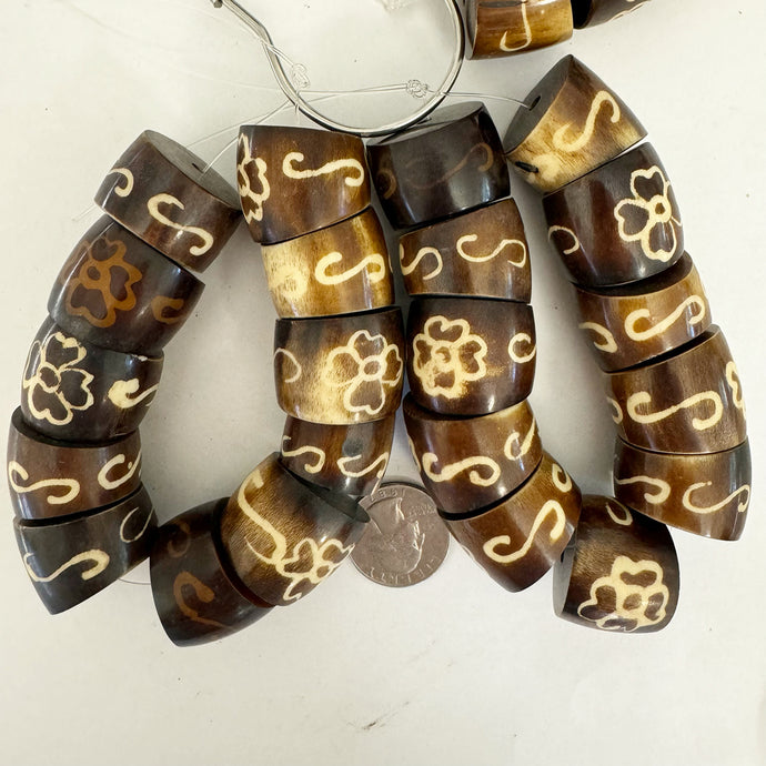 faux bone look fower motif resin, dark brown white, 25x21mm rondelle, 11pc strand, sold per strand