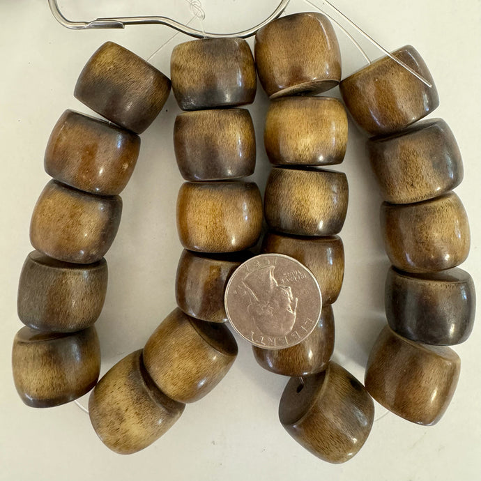 faux bone look resin, dark brown white, 23x20mm rondelle, 11pc strand, sold per strand