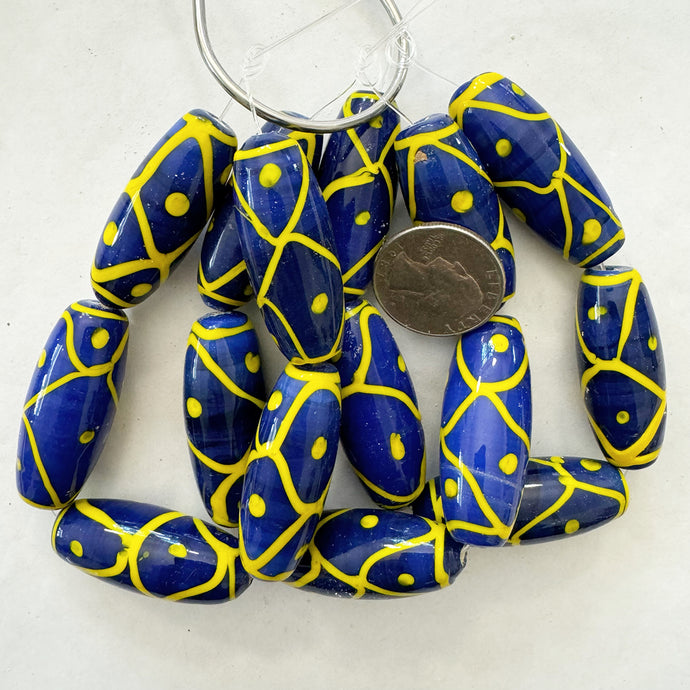 swirling lines dot motif glass, blue yellow, 42x16mm bowed tube, 5 piece strand, sold per strand