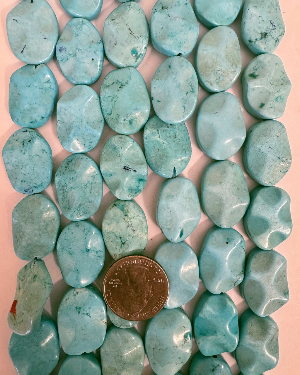 color enhanced light turquoise blue magnesite, 25x18x6mm irregular wavy oval, 15