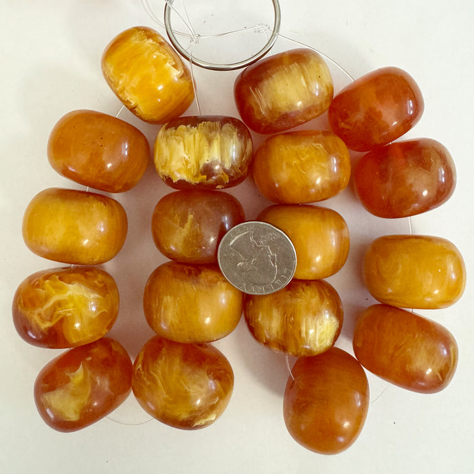 faux amber look resin, red orange white swirl, 33x24mm rondelle, 9pc strand, sold per strand