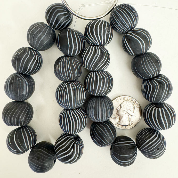 vintage look glass, matte finish, black and white, horizontal stripe motif, 20mm irregular round mix,  sold per 12pc strand