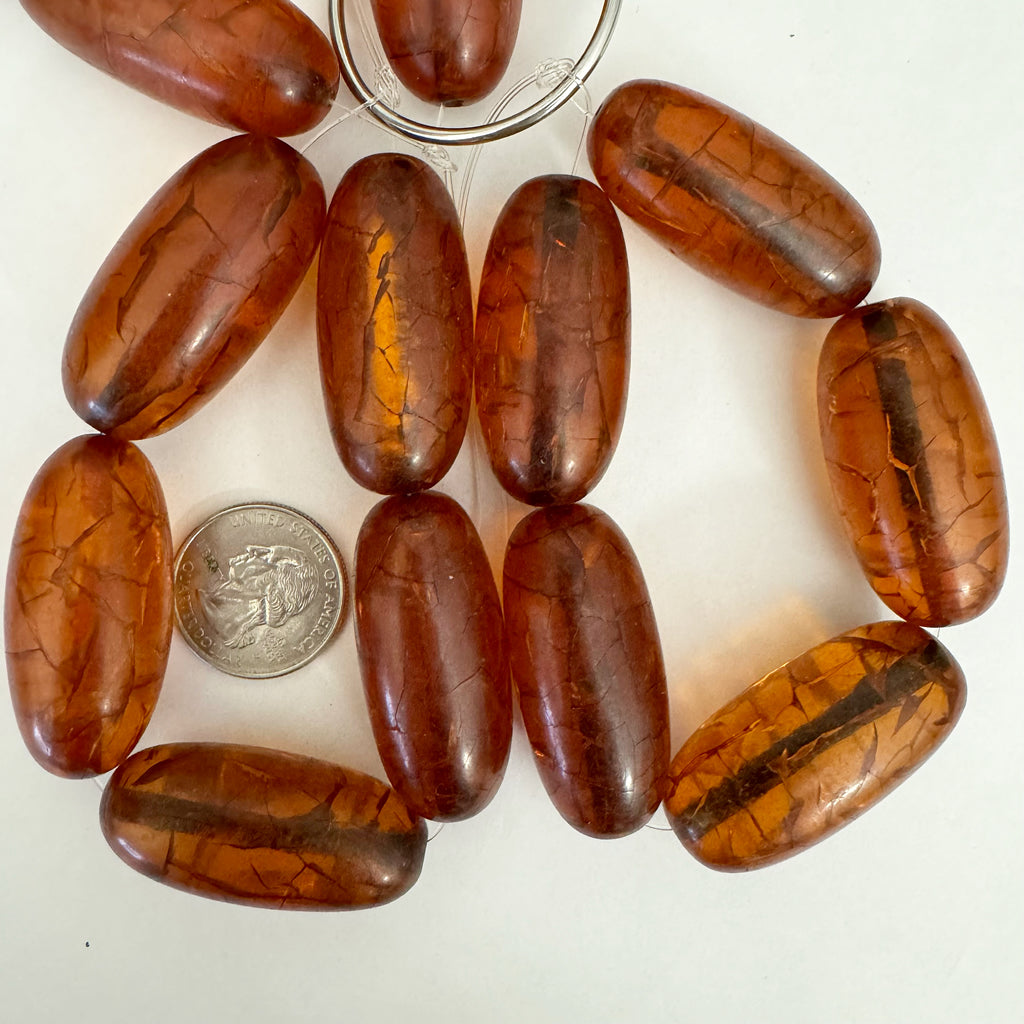 crackle motif resin, dark red amber, 41x19mm bowed tube, 5pc strand, sold per strand