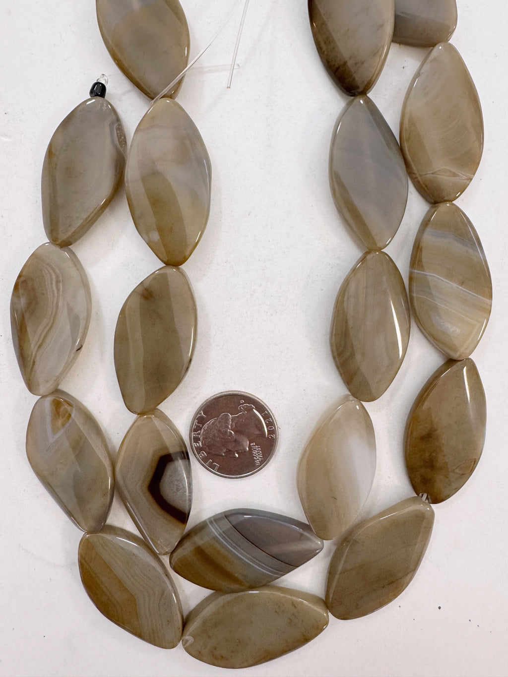 color enhanced brown line agate, 40x22x7mm twist horse eye, 15