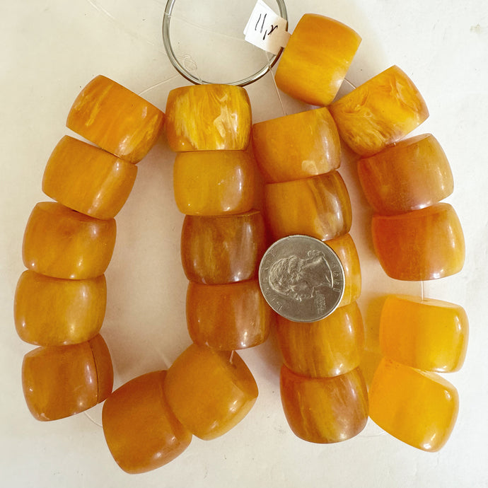 faux amber resin, orange white swirl, 28x22mm slices rondelle, 10pc strand, sold per strand