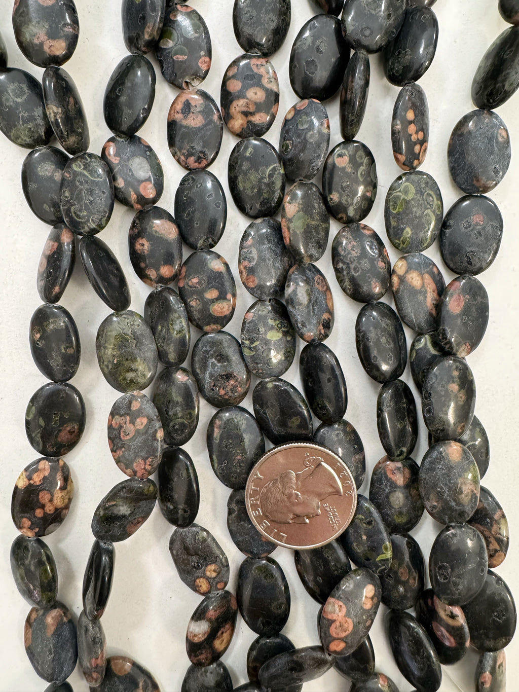 black leopard skin jasper, 19x17x6mm oval, 15