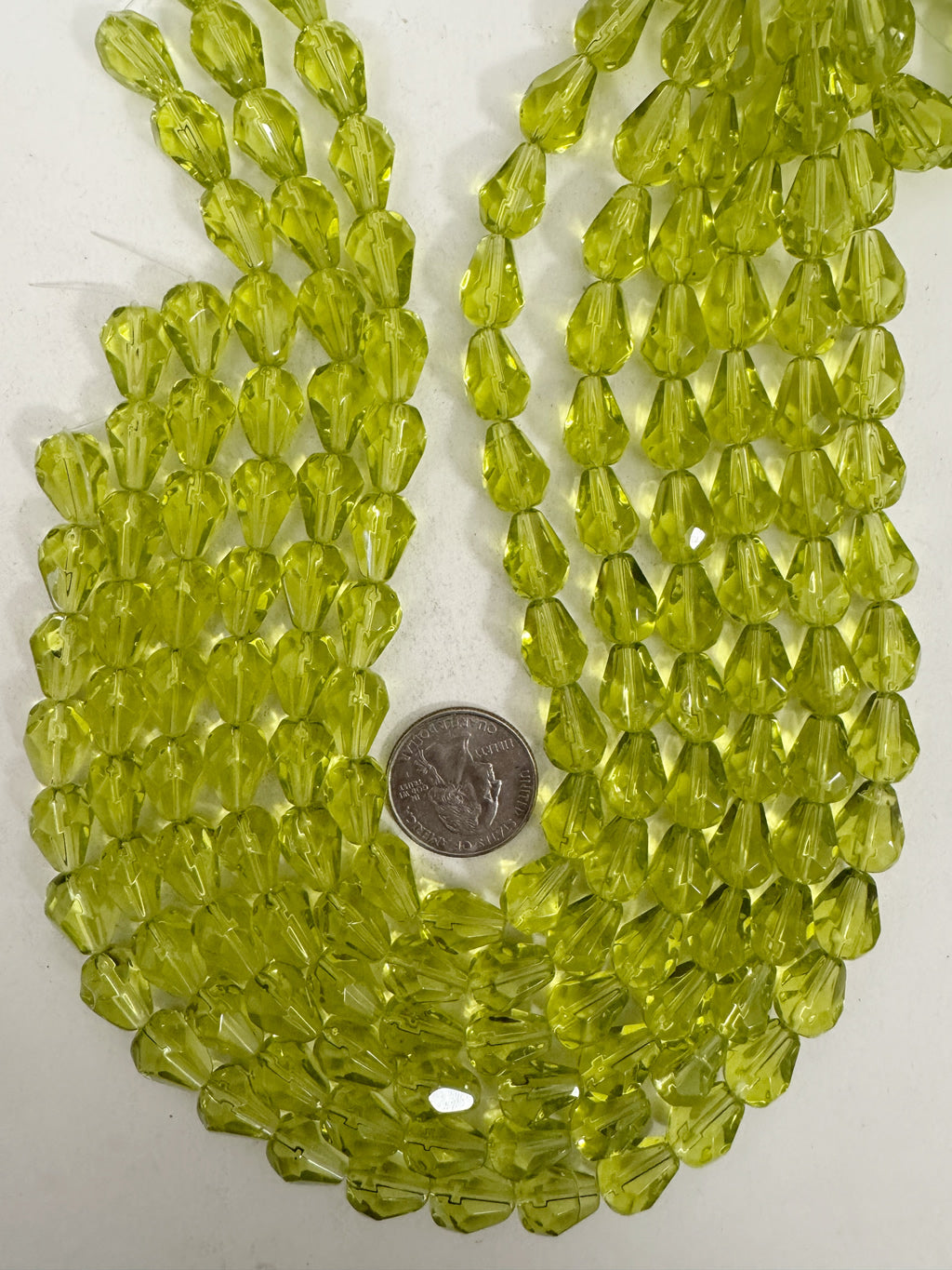 glass, jewel tone yellow olive green, 13x10mm faceted pear teardrop, 13.5