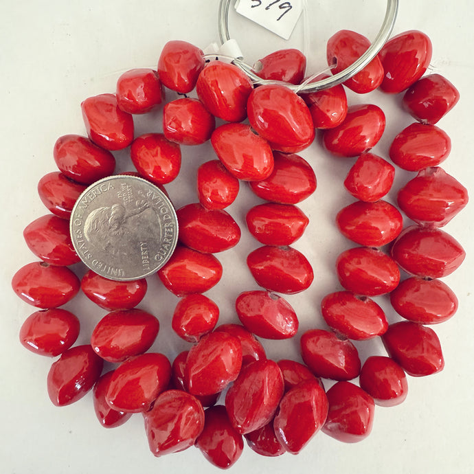 glass, pale red, 16x10x10mm nugget, 19 piece strand, sold per strand