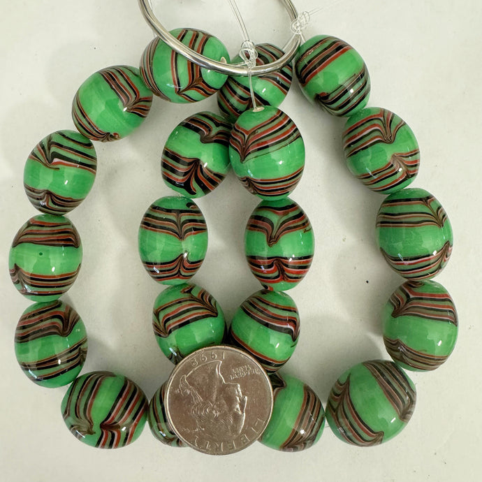 feathered lines motif glass, mint green white black red, 20x17mm barrel, 10 piece strand, sold per strand