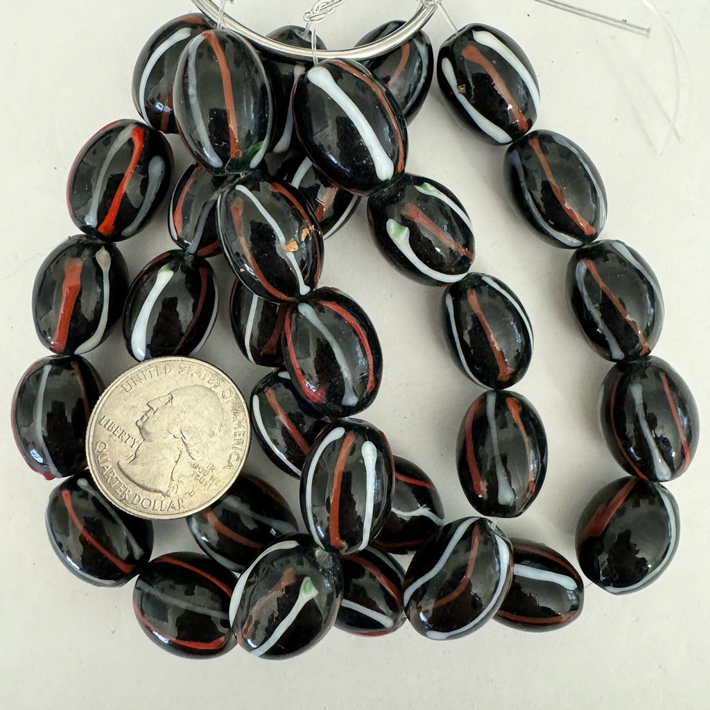 stripes motif glass, black white red orange, 19x14mm bowed tube, 11 piece strand, sold per strand