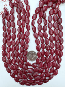 Color enhanced ruby jade, 14x10x5mm oval,  15" strand, sold per strand