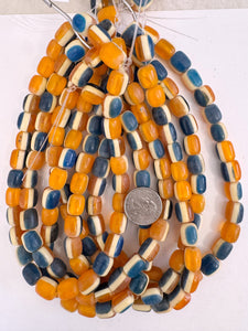 vintage look stripe motif resin, amber orange white blue, 12x10mm barrel, 15" strand, sold per strand