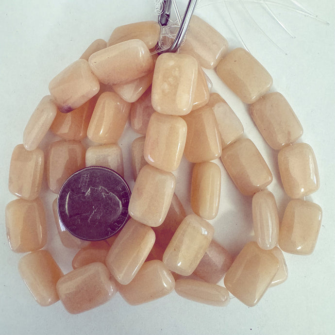 peach jade, 18x13x7mm puff rectangle, 11 piece strand, sold per strand