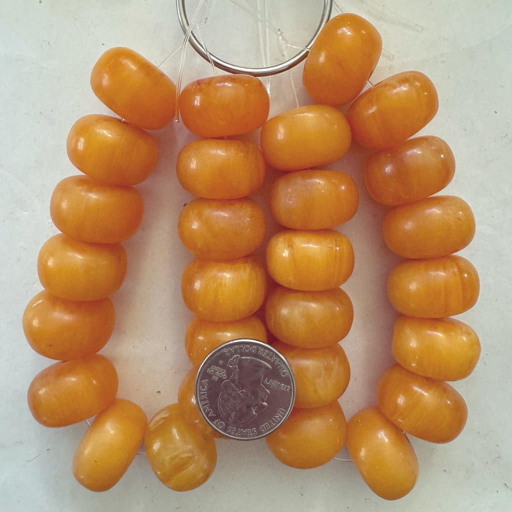 faux amber resin, orange white swirl, 23x15mm rondelle, 14pc strand, sold per strand