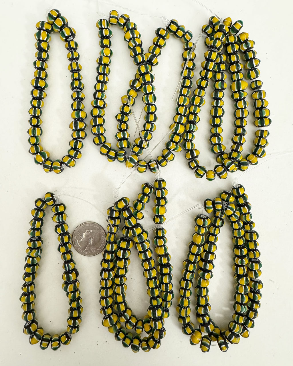 chevron motif glass, black green yellow white, 11x6mm rondelle size mix, 10 strand closeout lot