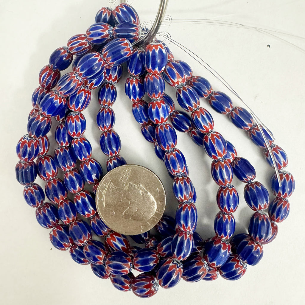 chevron motif glass, red white blue, 9x8mm mixed size barrel, 23 piece strand, sold per strand