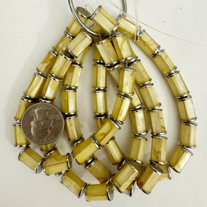 mother of pearl shell encased in resin, 16x9mm capped tube, 14 piece strand, sold per strand