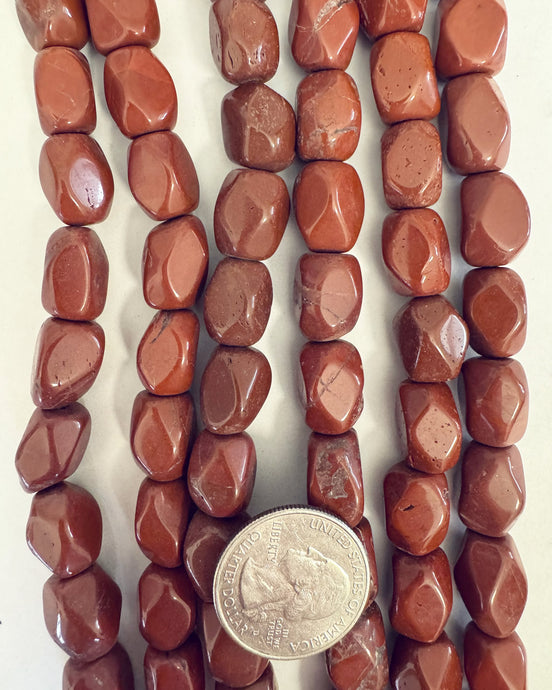 natural red jasper, semi dull finish, some off center drilled, 16x11x11mm faceted nugget, 15