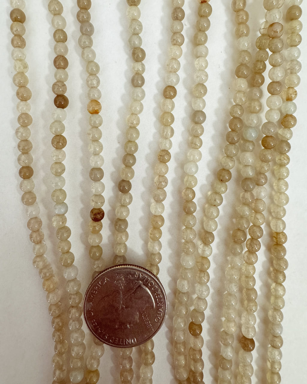 color enhanced brown golden mix chalcedony, 4mm round, 15