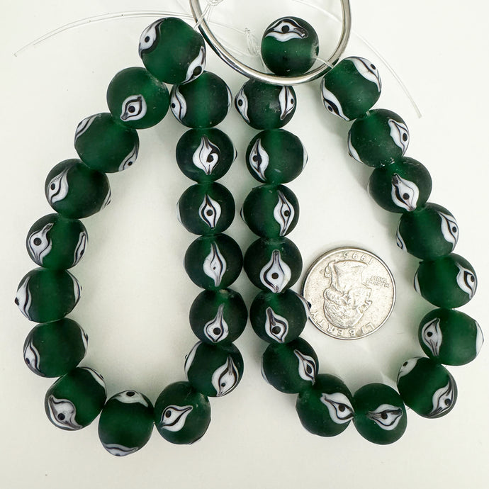 evil eye motif glass, matte finish, dark green black white, 14x11mm mixed size rondelle, 16 piece strand, sold per strand