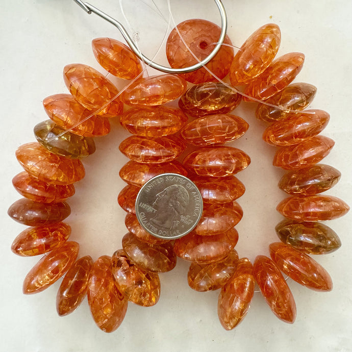 vintage look crackle faux amber resin, translucent red orange 26x9mm barrel, 19pc strand, sold per strand