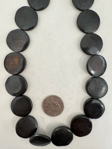 black bone, 22x22x6mm coin, 15" strand, item sold per strand