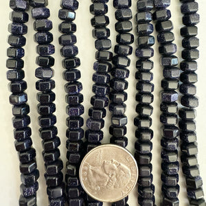Blue Goldstone, 7x6mm geometric faceted, 15" strand