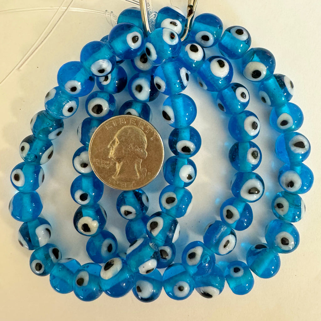 evil eye motif glass, bright blue black white, 11mm round, 21 piece strand, sold per strand