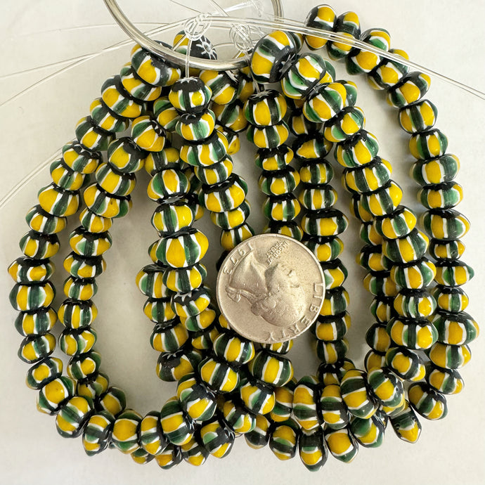 chevron motif glass, black green yellow white, 11x6mm rondelle size mix, 34 piece strand, sold per strand