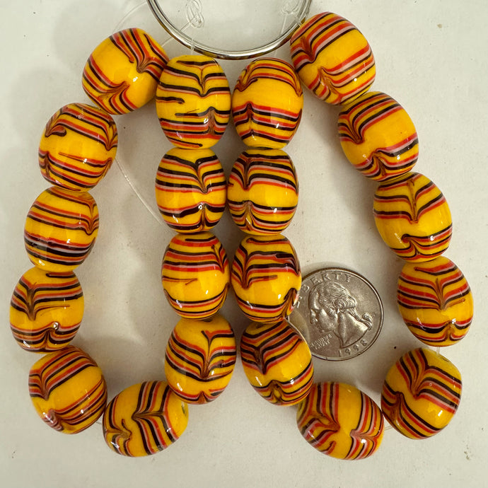 feathered lines motif glass, mustard yellow white black red, 20x17mm barrel, 10 piece strand, sold per strand