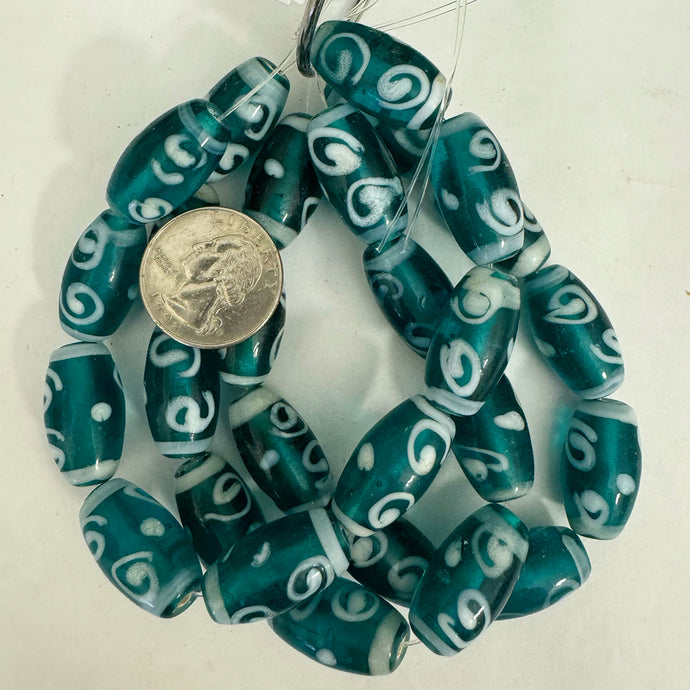 swirls lines motif glass, dark teal blue white, 27x13mm barrel, 9 piece strand, sold per strand