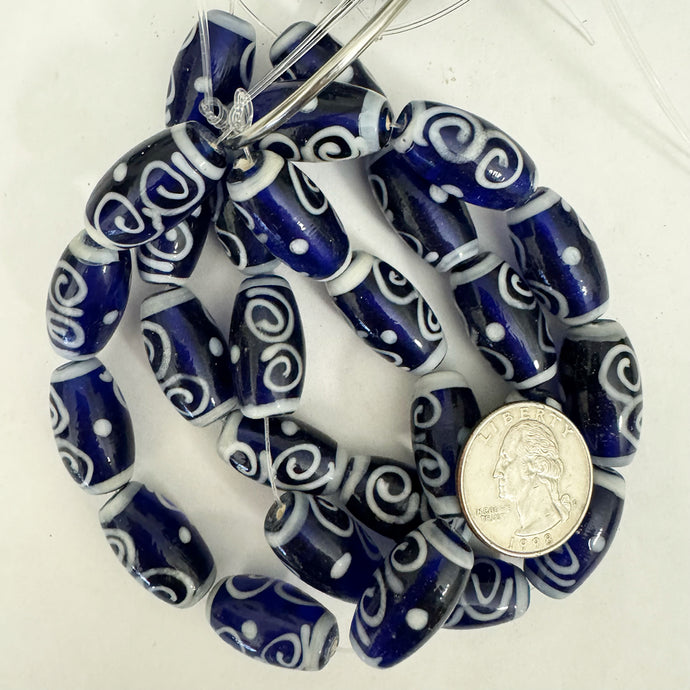 swirls lines motif glass, blue white, 27x13mm barrel, 9 piece strand, sold per strand