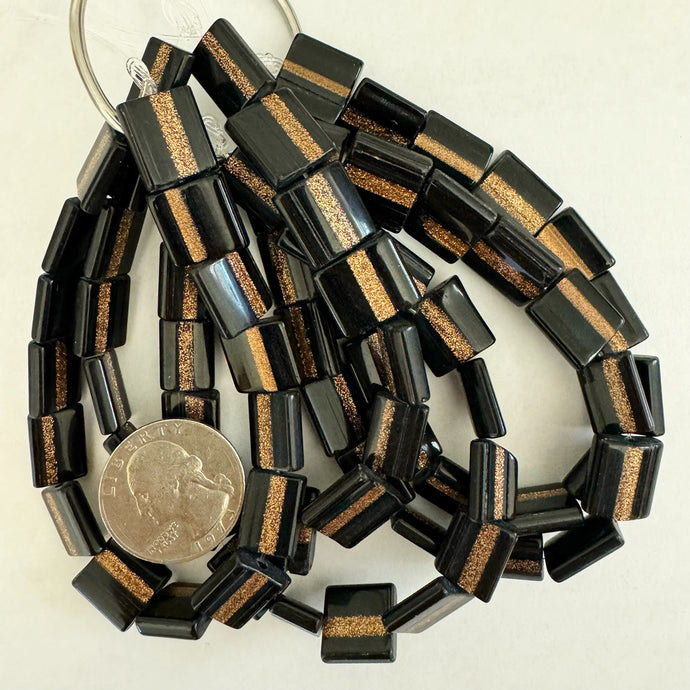 stripe motif glass, black pearly copper, 13x12x4mm rectangle mix, 16 piece strand, sold per strand