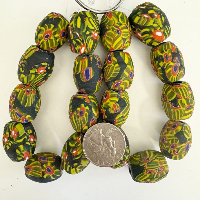 millefiori motif glass, matte black green yellow red blue, 22x19mm barrel size mix, 9 piece strand, sold per strand