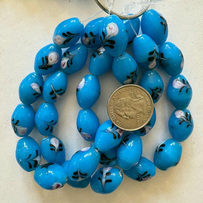 floral motif glass, light blue, 19x13mm bowed tube, 11 piece strand, sold per strand