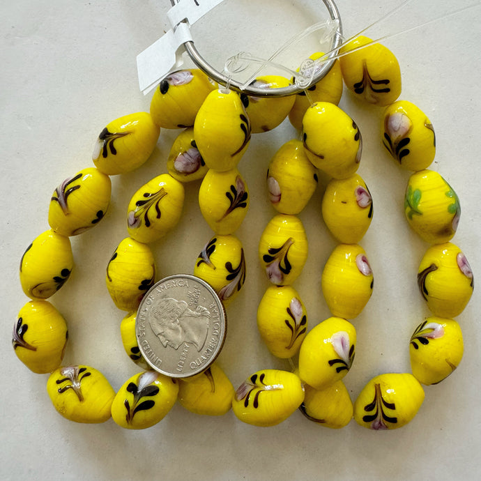 floral motif glass, yellow, 19x13mm bowed tube, 11 piece strand, sold per strand