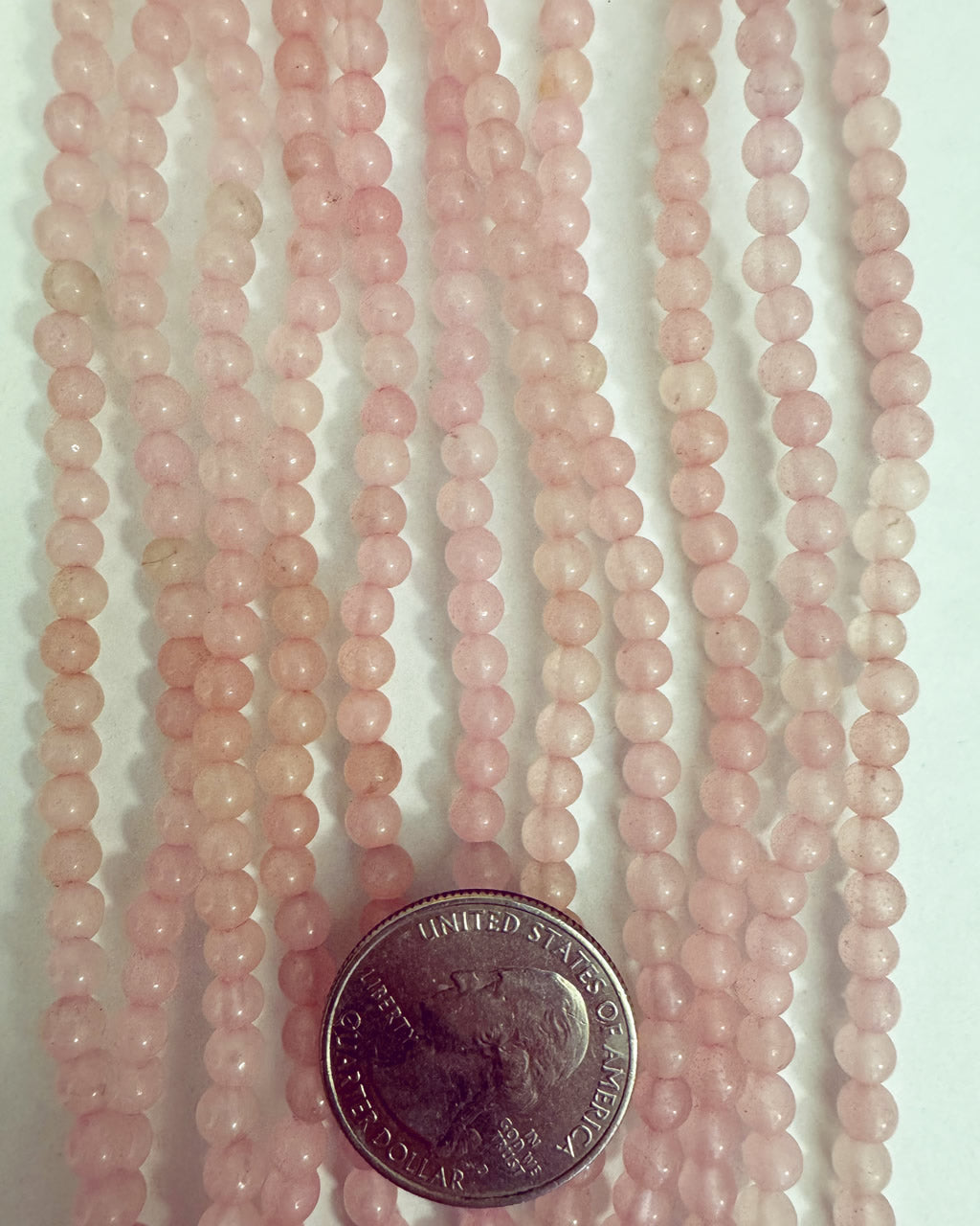 color enhanced rose quartz, 4mm round, 15